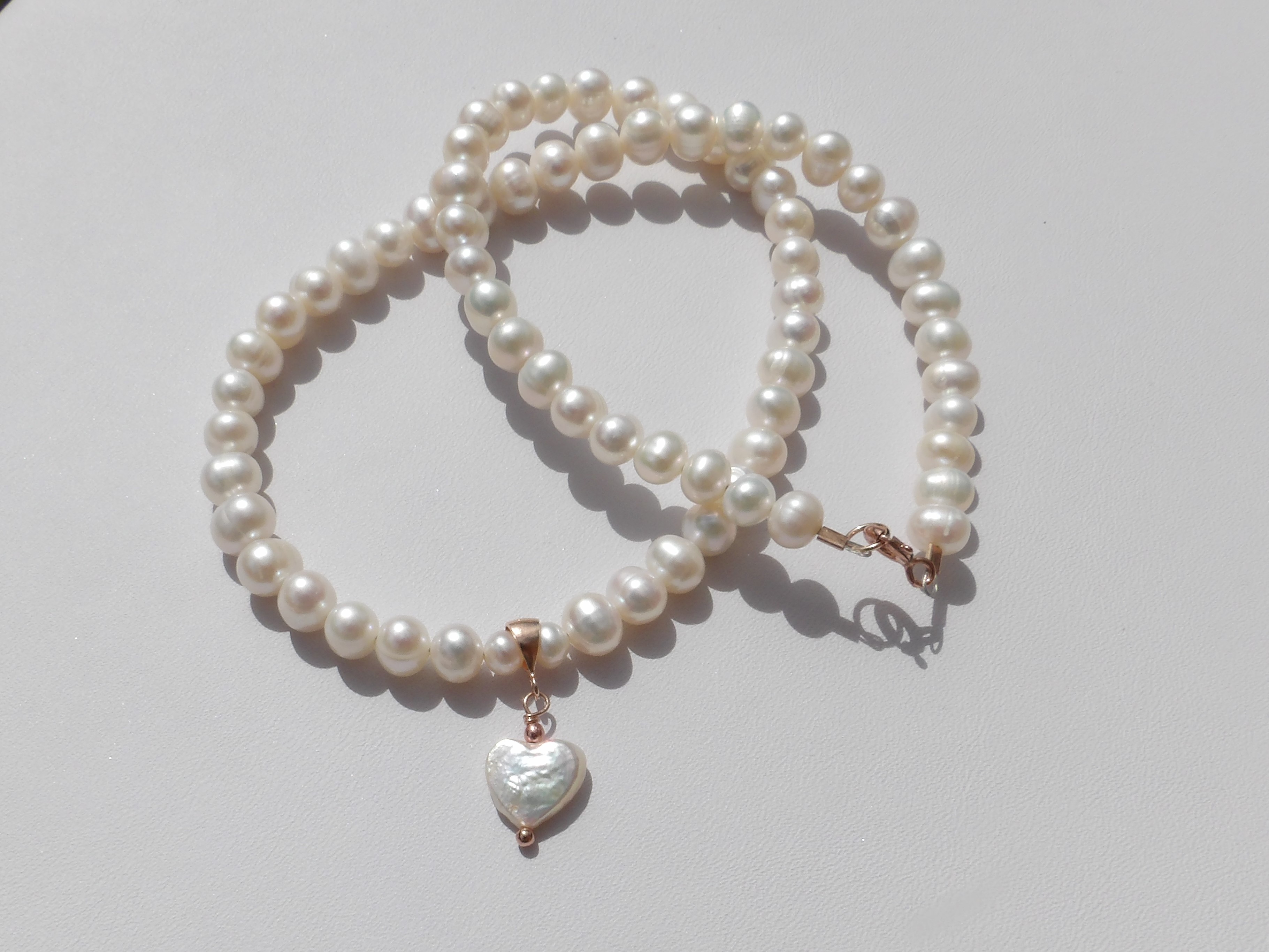 pearl necklace with heart pendant
